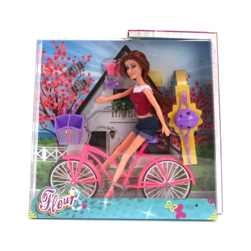 Ga uit fietsen met de pop Fleur en fiets set Fleur is graag actief bezig. Zet haar helm op, zet haar op haar kleurrijke fiets en ga lekker met haar fietsen.